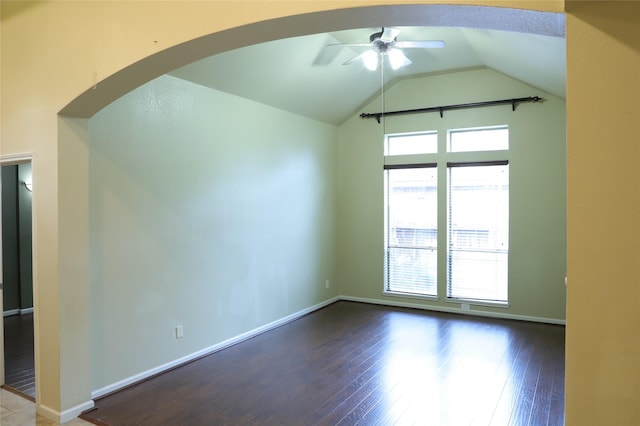 unfurnished room featuring wood-type flooring, baseboards, and a ceiling fan