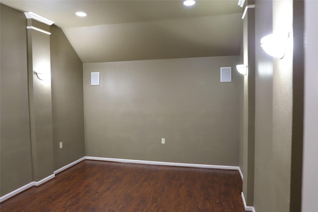 interior space with recessed lighting, wood finished floors, baseboards, vaulted ceiling, and ornate columns