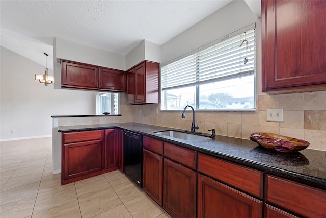 kitchen featuring dishwasher, a peninsula, tasteful backsplash, and a sink