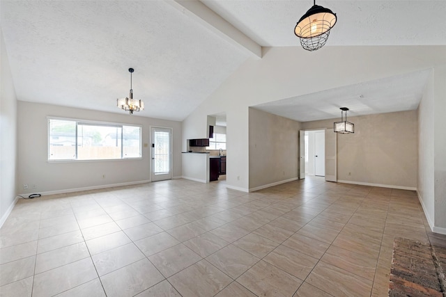 unfurnished living room featuring light tile patterned floors, baseboards, and a chandelier