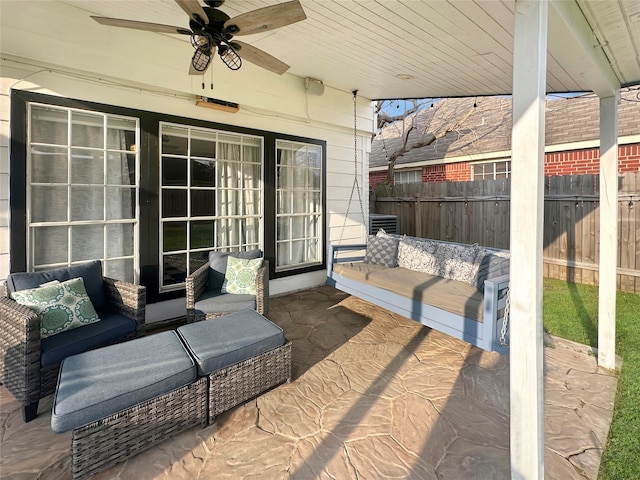 view of patio / terrace featuring central AC unit, an outdoor living space, a ceiling fan, and fence