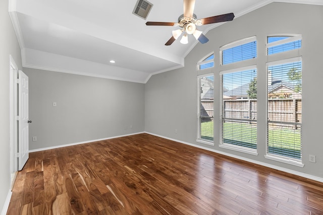 unfurnished room featuring dark wood finished floors, visible vents, ceiling fan, and vaulted ceiling