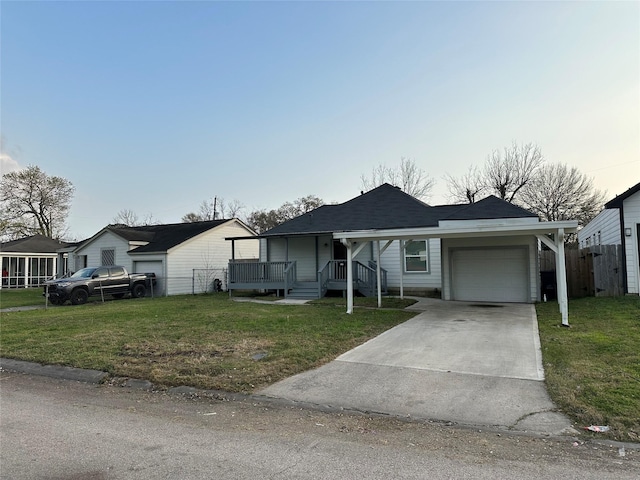 single story home with a garage, fence, and a front lawn