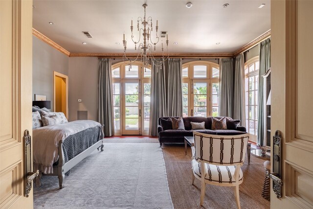 bedroom with access to outside, multiple windows, visible vents, and a notable chandelier