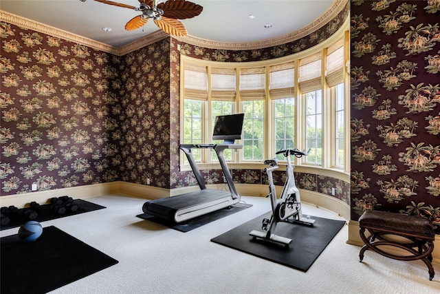 workout room with carpet floors, wallpapered walls, ceiling fan, and baseboards