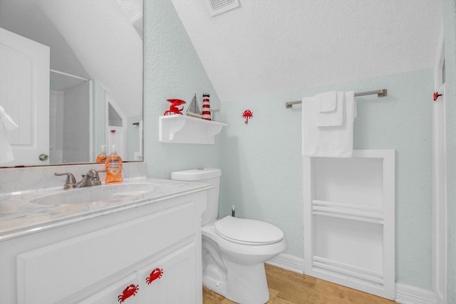 full bath featuring visible vents, toilet, vaulted ceiling, wood finished floors, and vanity