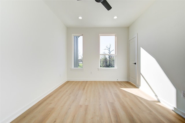 interior space featuring baseboards, ceiling fan, light wood-style flooring, and recessed lighting