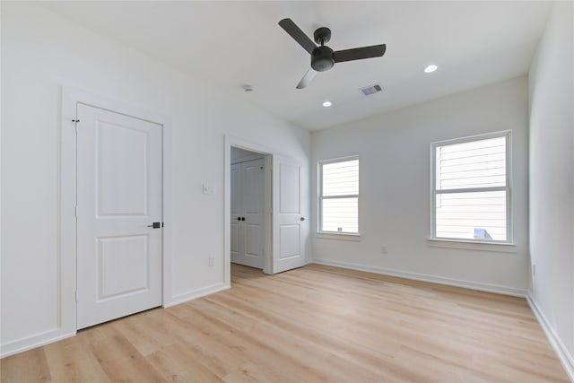 unfurnished bedroom with light wood finished floors, baseboards, visible vents, ceiling fan, and recessed lighting