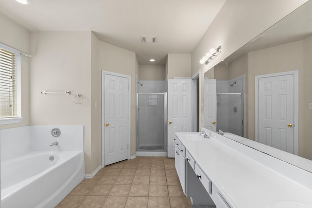 full bathroom featuring double vanity, visible vents, a bath, and a shower stall