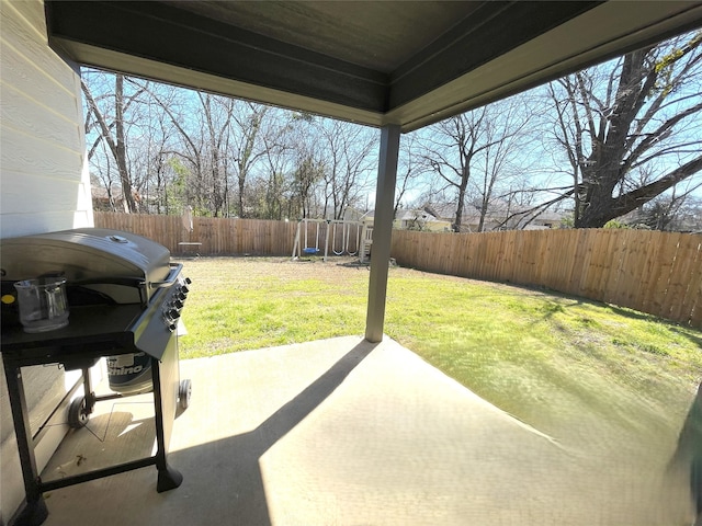 view of patio featuring a fenced backyard and area for grilling