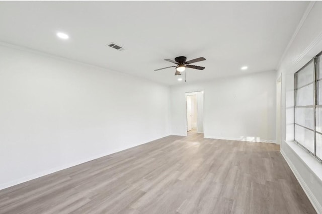 unfurnished room with light wood finished floors, visible vents, baseboards, ceiling fan, and recessed lighting