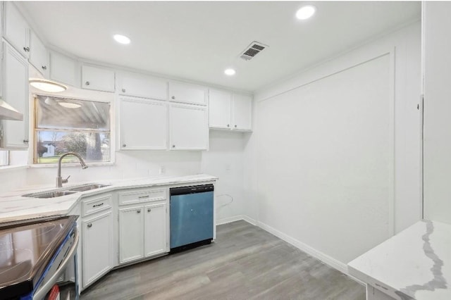 kitchen with light countertops, visible vents, dishwasher, and white cabinetry