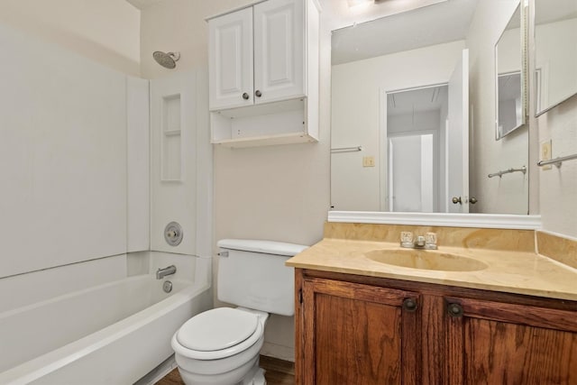 full bath featuring shower / washtub combination, vanity, and toilet