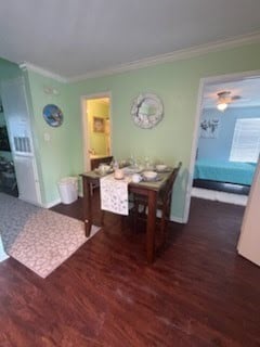 3506 Cove View Blvd Unit 1506, Galveston, TX 77554 - dining space featuring crown molding and wood finished floors