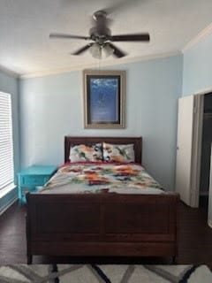 3506 Cove View Blvd Unit 1506, Galveston, TX 77554 - bedroom with ceiling fan and wood finished floors