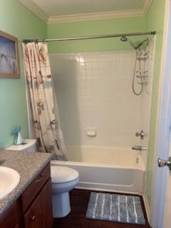 3506 Cove View Blvd Unit 1506, Galveston, TX 77554 - bathroom featuring crown molding, vanity, and shower / bath combination with curtain