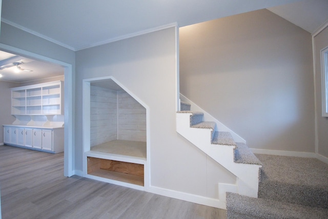 499 Mississippi Park, Conroe, TX 77302 - staircase with wood finished floors, ornamental molding, and baseboards