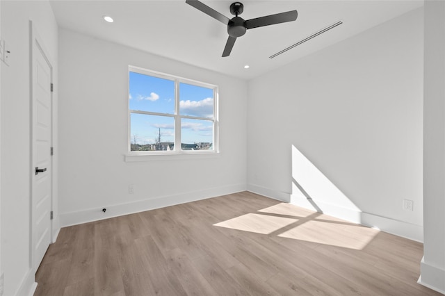 unfurnished bedroom featuring baseboards, wood finished floors, a ceiling fan, and recessed lighting