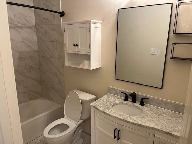 bathroom featuring toilet, shower / tub combination, and vanity