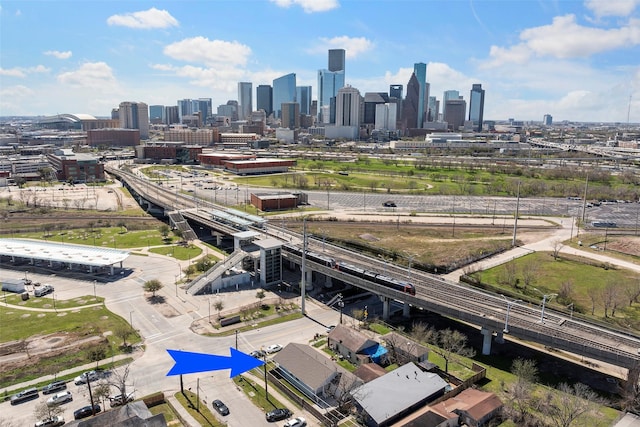 drone / aerial view with a view of city