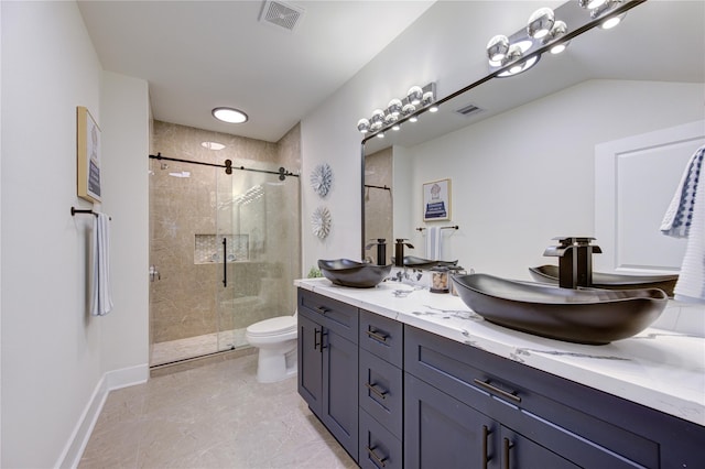 full bath featuring toilet, visible vents, and a sink