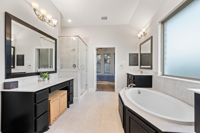 full bathroom featuring a garden tub, tile patterned flooring, vanity, visible vents, and a shower stall