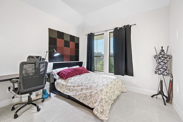 tiled bedroom with baseboards