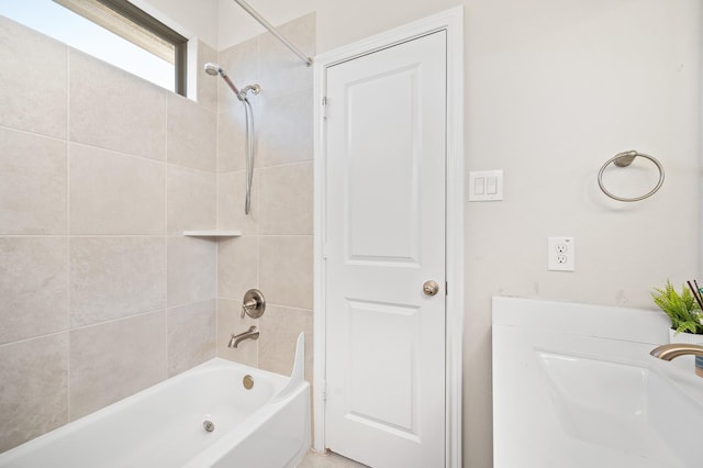 full bath with bathtub / shower combination and a sink