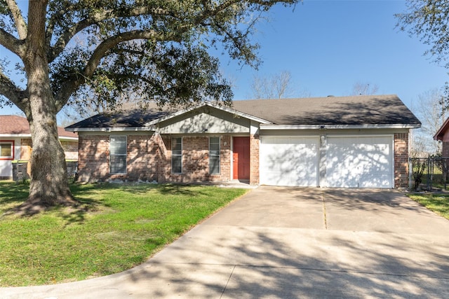 ranch-style home featuring a garage, brick siding, concrete driveway, and a front lawn