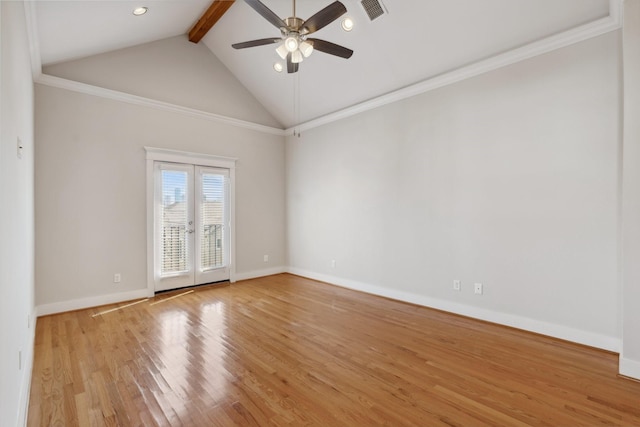 spare room featuring visible vents, baseboards, beamed ceiling, wood finished floors, and a ceiling fan