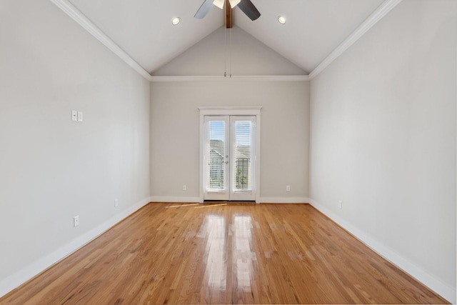 spare room featuring ceiling fan, light wood-style floors, baseboards, and ornamental molding