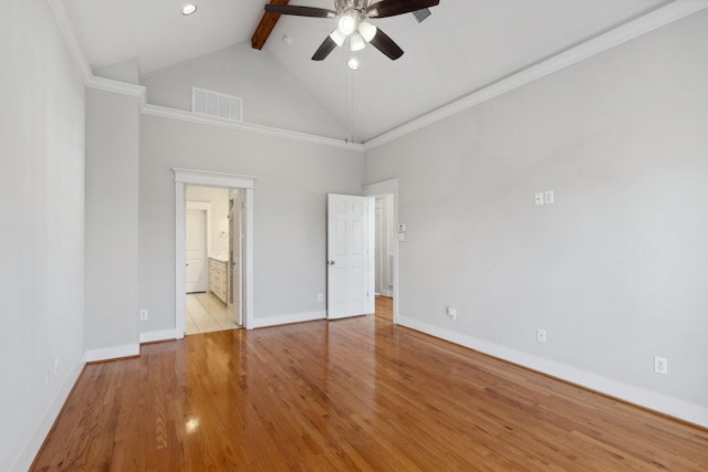 unfurnished bedroom featuring wood finished floors, visible vents, baseboards, high vaulted ceiling, and beamed ceiling