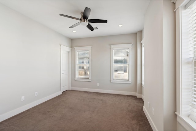 carpeted spare room featuring visible vents, recessed lighting, baseboards, and ceiling fan