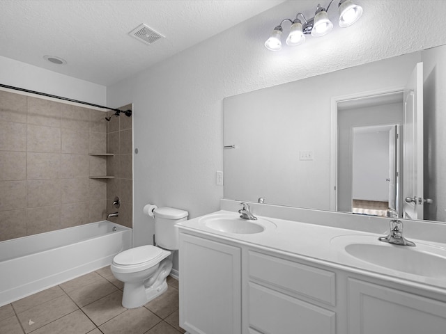 full bath featuring tile patterned floors, visible vents, toilet, and a sink