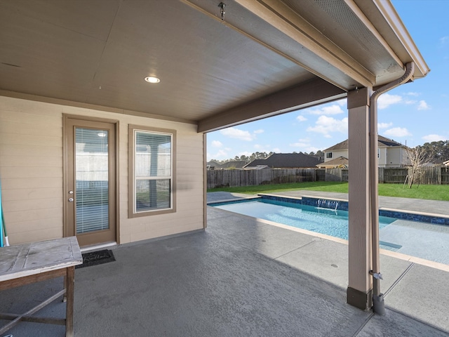 view of swimming pool featuring a patio area, a fenced in pool, and a fenced backyard