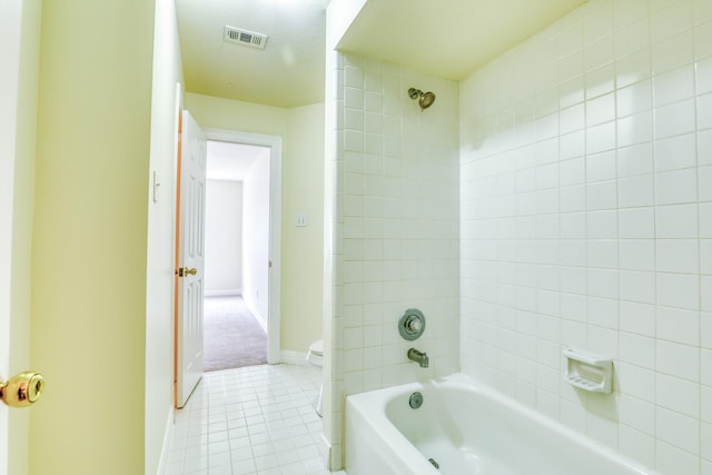 full bathroom featuring tile patterned floors, shower / bathing tub combination, baseboards, and visible vents