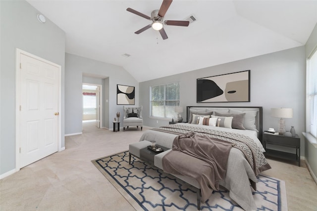 bedroom with visible vents, baseboards, a ceiling fan, light colored carpet, and lofted ceiling