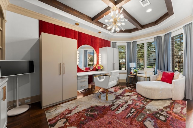 living area with coffered ceiling, wood finished floors, visible vents, beam ceiling, and built in desk