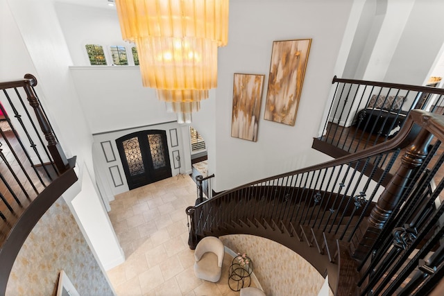 5006 Water View Bnd, Sugar Land, TX 77479 - tiled foyer with a high ceiling, stairway, and french doors