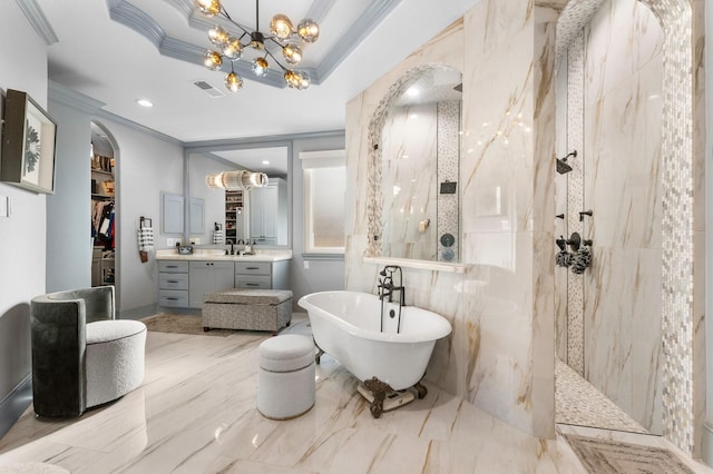 bathroom featuring a walk in shower, a freestanding tub, visible vents, vanity, and ornamental molding