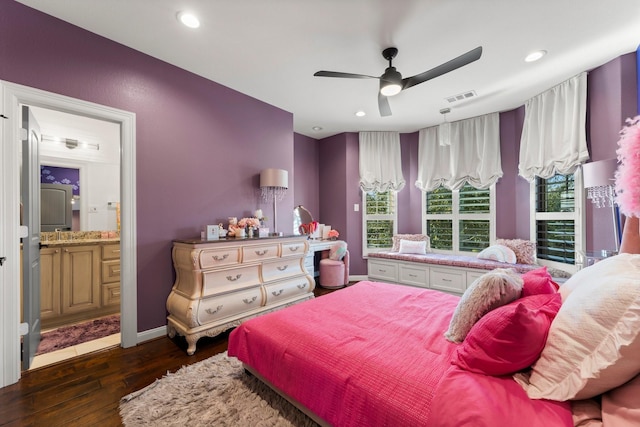 bedroom with connected bathroom, recessed lighting, visible vents, baseboards, and dark wood finished floors