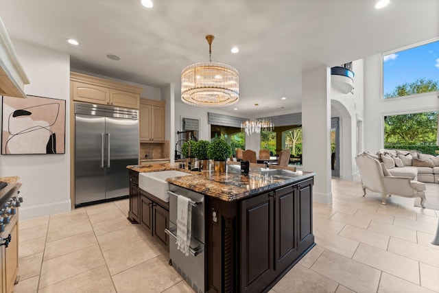 5006 Water View Bnd, Sugar Land, TX 77479 - kitchen featuring appliances with stainless steel finishes, a sink, a chandelier, recessed lighting, and open floor plan