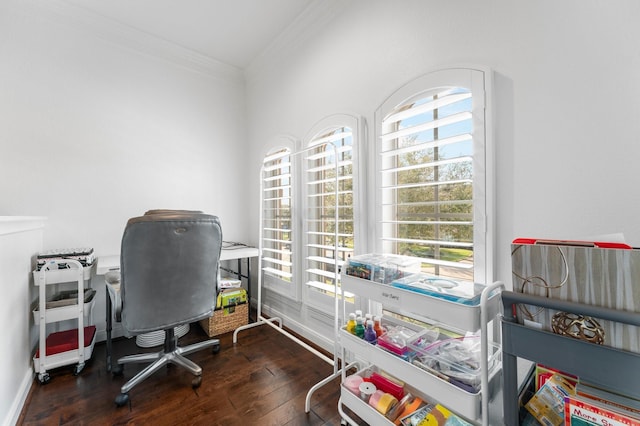 office space featuring ornamental molding, baseboards, and hardwood / wood-style flooring