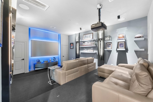 home theater room featuring visible vents