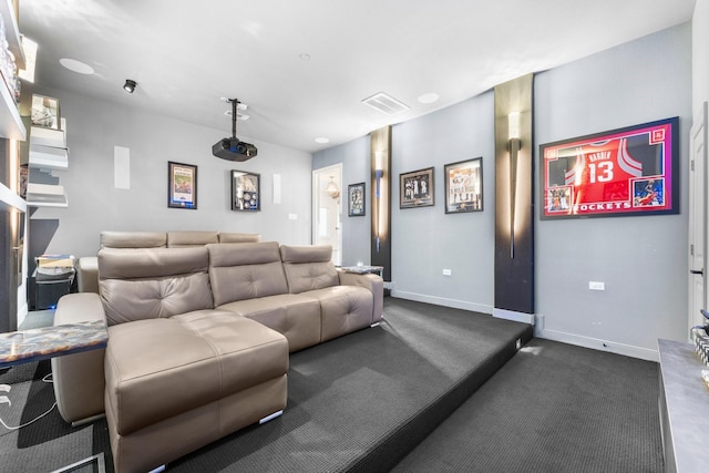 home theater room with visible vents and baseboards