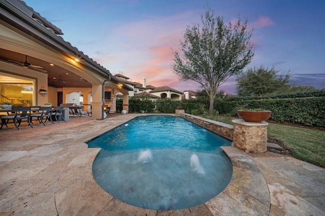5006 Water View Bnd, Sugar Land, TX 77479 - pool at dusk with a patio, a ceiling fan, and outdoor dining area