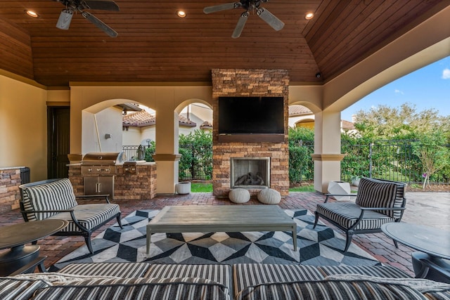5006 Water View Bnd, Sugar Land, TX 77479 - view of patio / terrace featuring an outdoor kitchen, a ceiling fan, and an outdoor living space with a fireplace