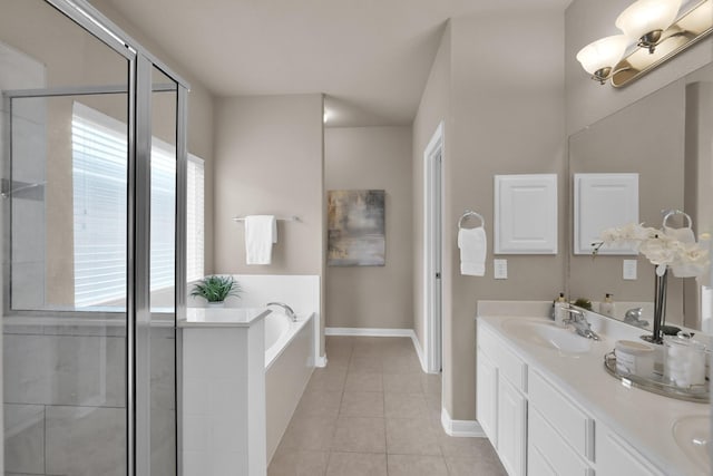 full bath featuring tile patterned flooring, a sink, a bath, double vanity, and a stall shower