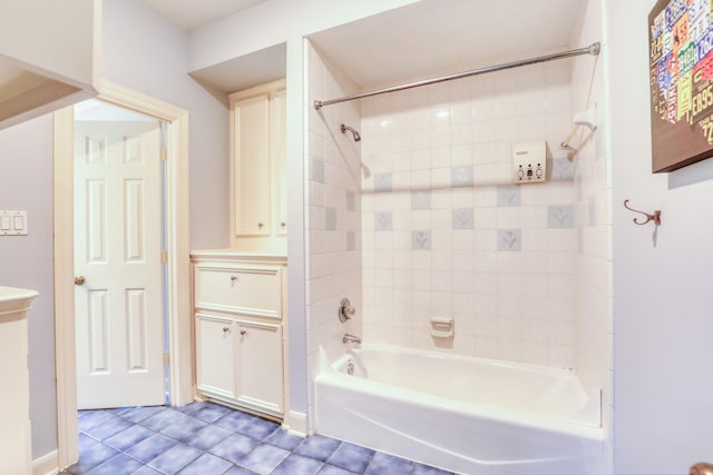 full bath with tile patterned flooring, shower / bath combination, and vanity