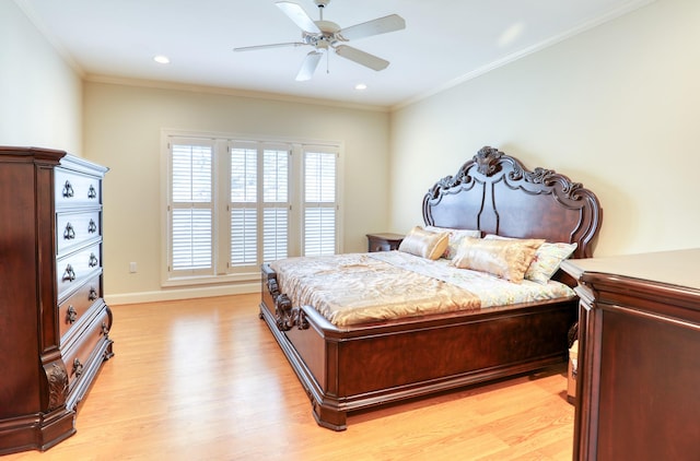 bedroom with light wood finished floors, ceiling fan, crown molding, and recessed lighting